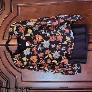 Avec long-sleeved batwing sheer top.